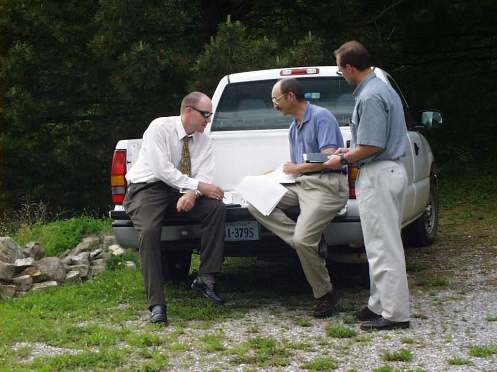 The first three VCE district Extension foresters--Dan Goerlich, Jim Willis, and Adam Downing (l-r) -- collaborate on project management (circa 2003).